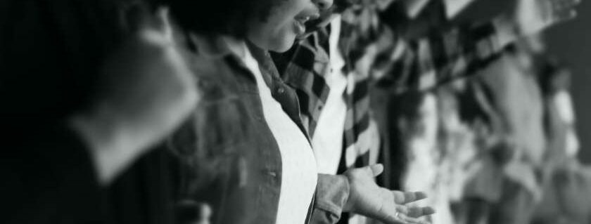 black and white believers people standing in praise and worship