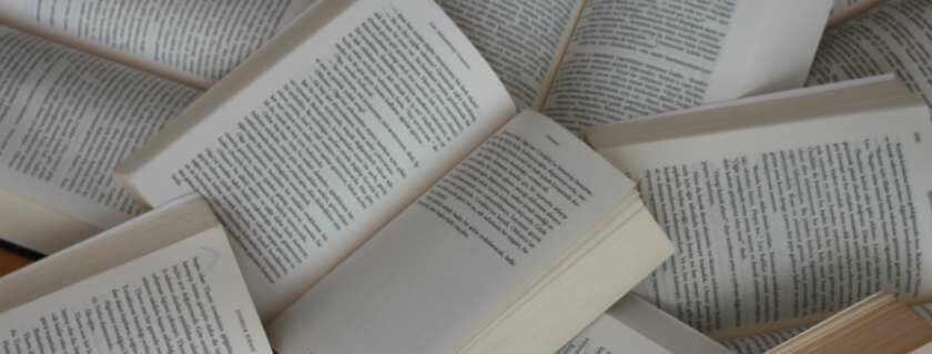 pile of open books